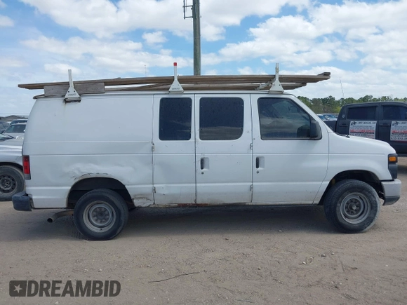 2013 Ford Econoline Cargo Commercial with VIN 1FTSE3EL4DDA38215, listed as a IAAI auction lot 41627924 with 181,821 mi miles. Bid and sale history available at carsss.com. Image 13.