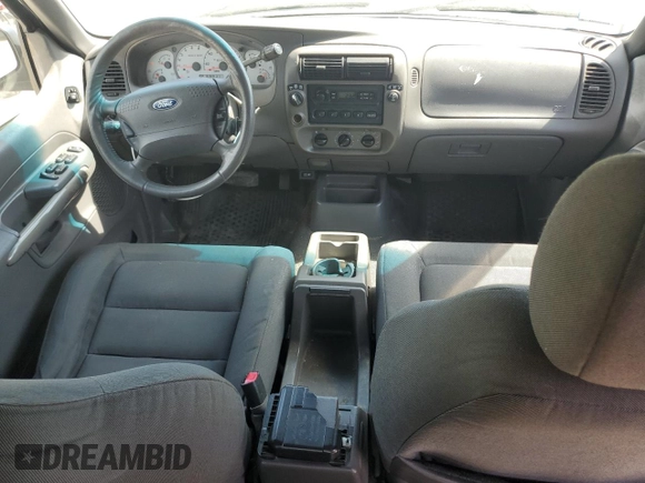 2001 Ford Explorer Sport Trac z VIN 1FMZU77E61UB01605, wystawiony jako Copart lot #56976175 z przebiegiem 106 313 mil mil oraz Czysty tytuł • Clean title. Historia ofert i sprzedaży dostępna na DreamBid. Obrazek 8.