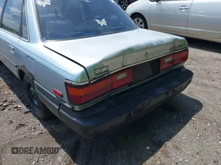 1988 Toyota Camry z VIN JT2SV21E1J3181554, wystawiony jako IAAI lot #42158520 z przebiegiem 167 012 mil mil oraz . Historia ofert i sprzedaży dostępna na DreamBid. Obrazek 6.