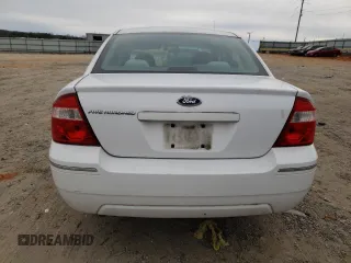 2005 Ford Five Hundred SE z VIN 1FAFP231X5G165841, wystawiony jako Copart lot #43117535 z przebiegiem 154 874 mil mil oraz Czysty tytuł • Clean title. Historia ofert i sprzedaży dostępna na DreamBid. Obrazek 6.