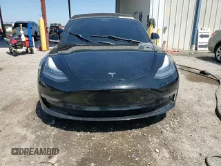 2019 Tesla Model 3 Mid Range z VIN 5YJ3E1EA9KF314143, wystawiony jako Copart lot #53564335 z przebiegiem 77 168 mil mil oraz Szkoda całkowita • Salvage title. Historia ofert i sprzedaży dostępna na DreamBid. Obrazek 14.