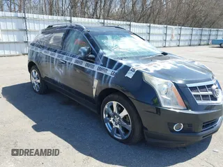 2011 Cadillac SRX Performance Collection with VIN 3GYFNEEY3BS560107, listed as a IAAI auction lot 42017220 with 243,740 mi miles and . Bid and sale history available at carsss.com. Image 1.