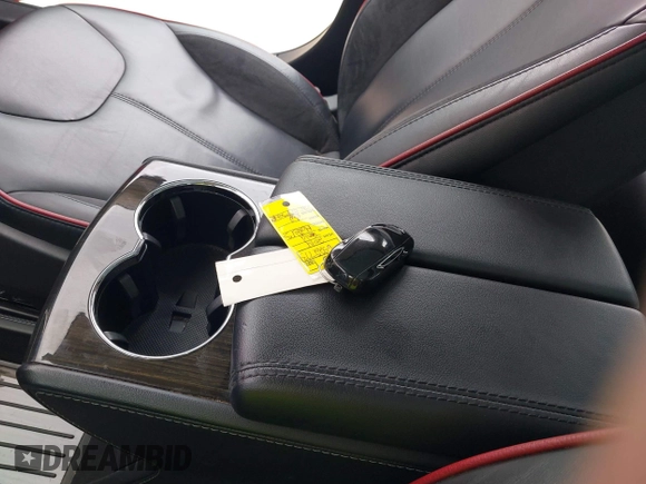 2014 Tesla Model S 60 with VIN 5YJSA1H17EFP30148, listed as a IAAI auction lot 39188024 with Not Provided miles and . Bid and sale history available at DreamBid. Image 11.