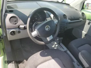 2003 Volkswagen Beetle GLS z VIN 3VWCD21C13M419124, wystawiony jako Copart lot #60352365 z przebiegiem 56 874 mil mil oraz Czysty tytuł • Clean title. Historia ofert i sprzedaży dostępna na DreamBid. Obrazek 8.