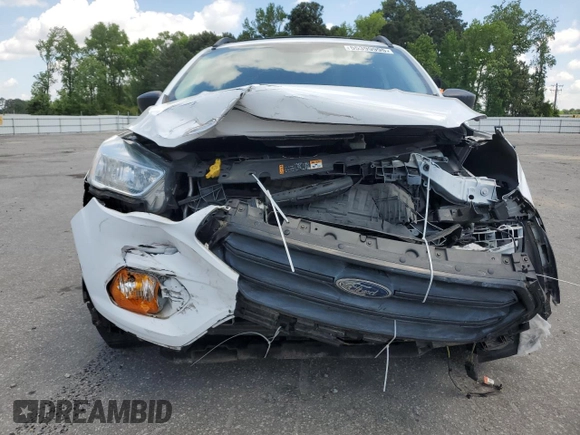 2017 Ford Escape S с VIN 1FMCU0F7XHUF03010, выставлен на аукционе Copart как лот 55399995 с пробегом 91 382 миль миль и Списание • Salvage title. История ставок и продаж доступна на DreamBid. Изображение 5.