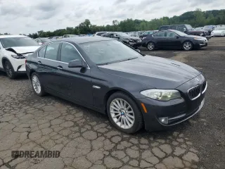 2013 BMW 5 Series 535i xDrive with VIN WBAFU7C51DDU66322, listed as a Copart auction lot 63049375 with 218,168 mi miles and Clean title. Bid and sale history available at DreamBid. Image 4.