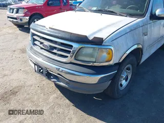 2002 Ford F-150 XL with VIN 1FTRX17272NA51467, listed as a IAAI auction lot 42095907 with 1 mi miles. Bid and sale history available at carsss.com. Image 6.