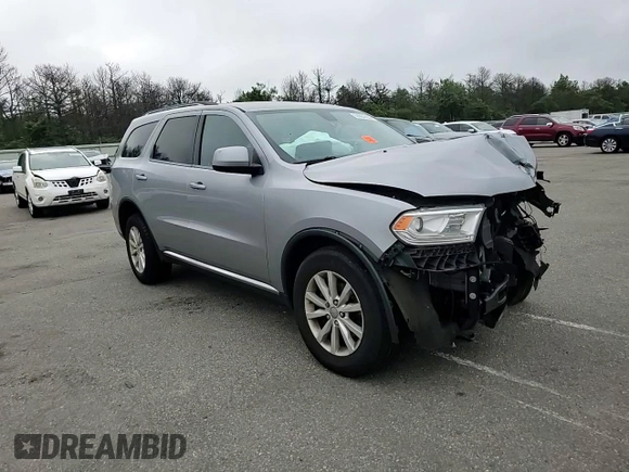 2015 Dodge Durango SXT z VIN 1C4RDJAG7FC870266, wystawiony jako Copart lot #63684455 z przebiegiem 91 686 mil mil oraz Szkoda całkowita • Salvage title. Historia ofert i sprzedaży dostępna na DreamBid. Obrazek 14.