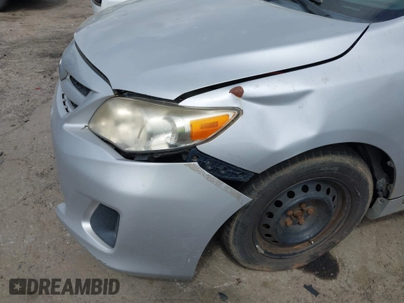 2011 Toyota Corolla L with VIN 2T1BU4EE8BC687021, listed as a IAAI auction lot 41934778 with 176,587 mi miles. Bid and sale history available at carsss.com. Image 6.