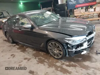 2018 BMW 5 Series M550i xDrive with VIN WBAJB9C53JB049920, listed as a IAAI auction lot 42216748 with 53,036 mi miles and . Bid and sale history available at DreamBid. Image 1.
