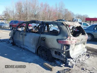 2015 Toyota Sienna XLE with VIN 5TDYK3DC4FS630998, listed as a IAAI auction lot 41672959 with Not provided miles and . Bid and sale history available at DreamBid. Image 3.
