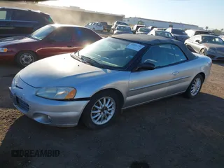 2001 Chrysler Sebring LXi with VIN 1C3EL55U91N660200, listed as a IAAI auction lot 41631756 with 124,867 mi miles and . Bid and sale history available at DreamBid. Image 2.