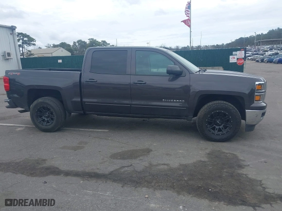 2015 Chevrolet Silverado 1500 LT with VIN 3GCUKREC9FG519510, listed as a IAAI auction lot 42026865 with 119,510 mi miles. Bid and sale history available at carsss.com. Image 13.