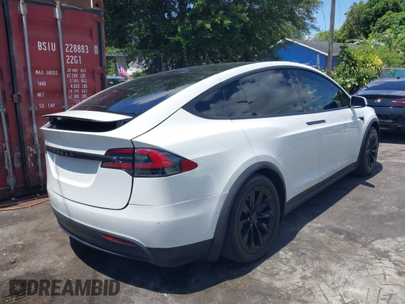 2017 Tesla Model X 90D z VIN 5YJXCBE25HF078198, wystawiony jako IAAI lot #42470050 z przebiegiem 66 850 mil mil oraz . Historia ofert i sprzedaży dostępna na DreamBid. Obrazek 4.