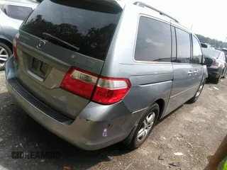 2006 Honda Odyssey EX-L with VIN 5FNRL38706B107724, listed as a IAAI auction lot 39245592 with 186,885 mi miles. Bid and sale history available at carsss.com. Image 4.