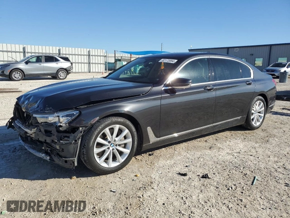 2018 BMW 7 Series 740i with VIN WBA7E2C55JG742497, listed as a Copart auction lot 82173994 with 52,354 mi miles and Salvage Title. Bid and sale history available at carsss.com. Image 1.