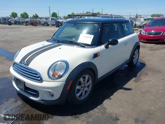 2013 MINI Hardtop z VIN WMWSU3C59DT544374, wystawiony jako IAAI lot #42302212 z przebiegiem 76 856 mil mil oraz . Historia ofert i sprzedaży dostępna na DreamBid. Obrazek 2.