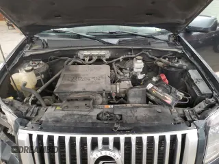 2010 Mercury Mariner Premier with VIN 4M2CN9HGXAKJ04578, listed as a Copart auction lot 63043405 with 107,803 mi miles and Salvage title. Bid and sale history available at DreamBid. Image 12.