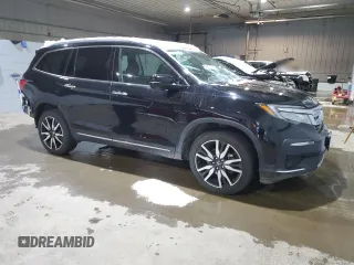 2021 Honda Pilot Elite with VIN 5FNYF6H05MB005324, listed as a Copart auction lot 82866734 with 126,630 mi miles and Salvage Title. Bid and sale history available at DreamBid. Image 4.