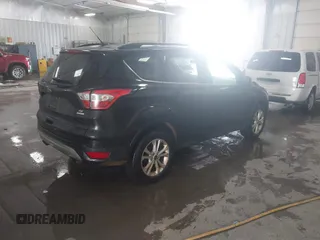 2018 Ford Escape SE with VIN 1FMCU0G99JUC89312, listed as a IAAI auction lot 41484138 with 149,739 mi miles. Bid and sale history available at carsss.com. Image 4.