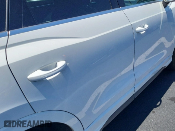 2023 Audi Q3 S line Premium with VIN WA1DECF37P1081194, listed as a IAAI auction lot 42796405 with 58,808 mi miles and . Bid and sale history available at DreamBid. Image 6.
