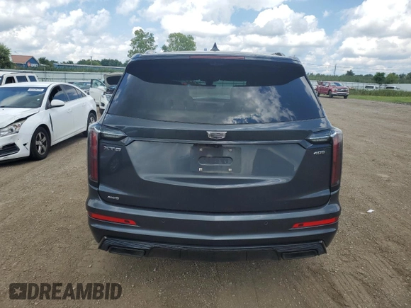 2021 Cadillac XT6 Sport z VIN 1GYKPGRS0MZ187818, wystawiony jako Copart lot #66967824 z przebiegiem 66 956 mil mil oraz Szkoda całkowita • Salvage title. Historia ofert i sprzedaży dostępna na DreamBid. Obrazek 6.