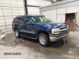 2003 Chevrolet Tahoe LS with VIN 1GNEK13Z03J303284, listed as a IAAI auction lot 41795469 with 242,018 mi miles. Bid and sale history available at carsss.com. Image 1.