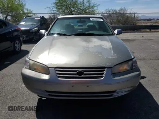 1999 Toyota Camry LE z VIN JT2BF22K4X0202019, wystawiony jako Copart lot #56104335 z przebiegiem 192 643 mil mil oraz Tytuł czysty. Historia ofert i sprzedaży dostępna na DreamBid. Obrazek 5.