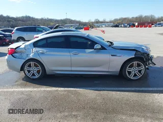 2015 BMW 6 Series 640i xDrive with VIN WBA6B8C52FD453433, listed as a IAAI auction lot 41805317 with 138,685 mi miles and . Bid and sale history available at carsss.com. Image 13.