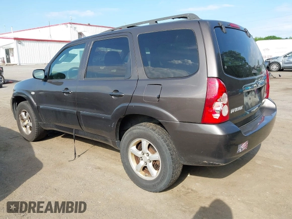2006 Mazda Tribute LX with VIN 4F2YZ94136KM23037, listed as a IAAI auction lot 42220090 with 144,039 mi miles and . Bid and sale history available at carsss.com. Image 3.