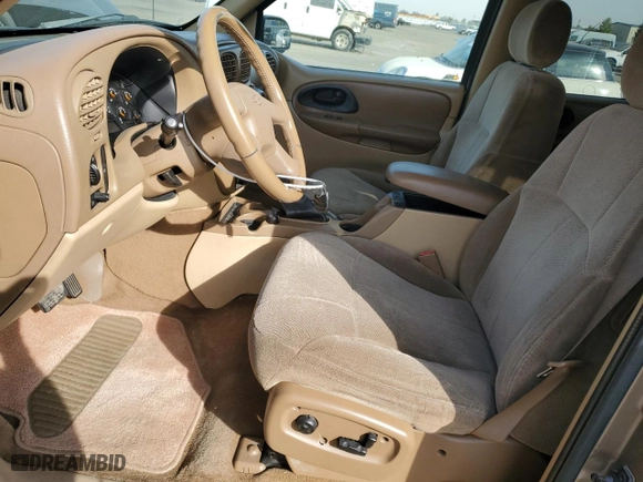 2003 Chevrolet TrailBlazer EXT LT with VIN 1GNES16P636186632, listed as a Copart auction lot 77703494 with 110,232 mi miles and Salvage Title. Bid and sale history available at carsss.com. Image 7.