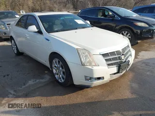 2009 Cadillac CTS AWD w/1SB with VIN 1G6DT57VX90140080, listed as a IAAI auction lot 41802817 with 146,978 mi miles. Bid and sale history available at carsss.com. Image 1.