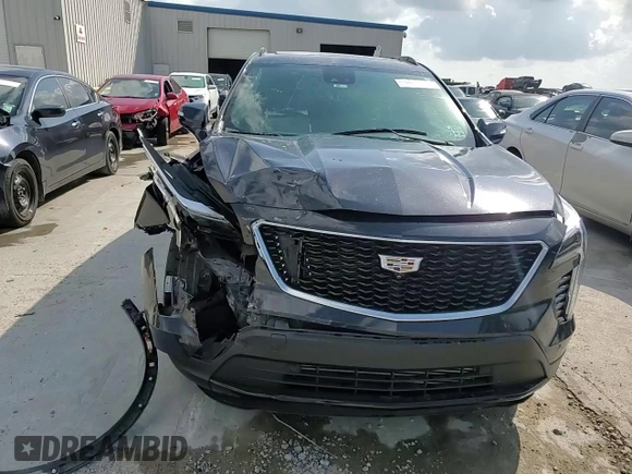 2022 Cadillac XT4 FWD Sport with VIN 1GYFZER46NF119009, listed as a Copart auction lot 57651725 with 37,896 mi miles and Salvage title. Bid and sale history available at DreamBid. Image 14.