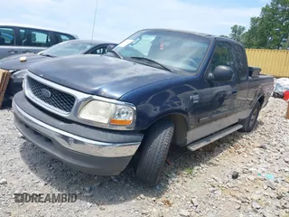 2003 Ford F-150 XL with VIN 1FTRX17W33NA65385, listed as a IAAI auction lot 42588871 with 250,273 mi miles and . Bid and sale history available at DreamBid. Image 2.