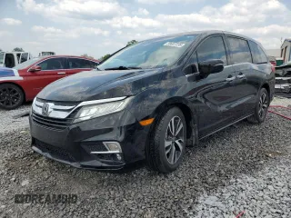 2018 Honda Odyssey Elite with VIN 5FNRL6H9XJB047849, listed as a Copart auction lot 59407235 with 188,722 mi miles and Salvage title. Bid and sale history available at DreamBid. Image 1.
