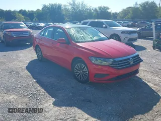 2019 Volkswagen Jetta S z VIN 3VWC57BU8KM055784, wystawiony jako IAAI lot #42245533 z przebiegiem 128 410 mil mil oraz . Historia ofert i sprzedaży dostępna na DreamBid. Obrazek 1.