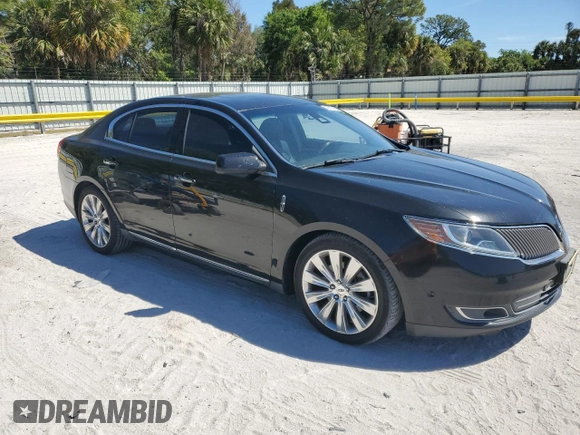2013 Lincoln MKS EcoBoost with VIN 1LNHL9FT8DG603948, listed as a Copart auction lot 49908455 with 133,493 mi miles and Salvage title. Bid and sale history available at DreamBid. Image 4.