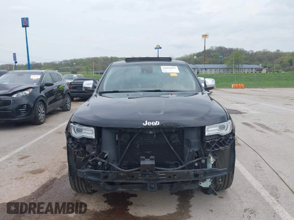 2015 Jeep Grand Cherokee Summit z VIN 1C4RJFJT0FC674494, wystawiony jako IAAI lot #42056835 z przebiegiem 143 969 mil mil oraz . Historia ofert i sprzedaży dostępna na DreamBid. Obrazek 13.