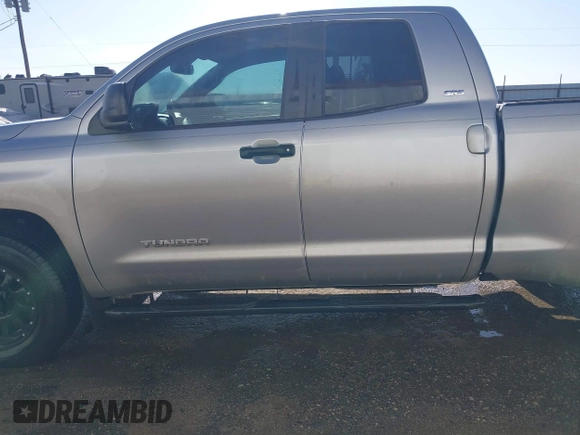 2014 Toyota Tundra SR with VIN 5TFRM5F13EX078411, listed as a IAAI auction lot 42702477 with 123,336 mi miles and . Bid and sale history available at DreamBid. Image 14.