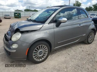 2012 FIAT 500 Lounge z VIN 3C3CFFER2CT164688, wystawiony jako Copart lot #56465835 z przebiegiem 128 997 mil mil oraz Szkoda całkowita • Salvage title. Historia ofert i sprzedaży dostępna na DreamBid. Obrazek 1.