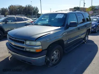 2002 Chevrolet Tahoe LT with VIN 1GNEC13ZX2R224413, listed as a IAAI auction lot 41818623 with 157,509 mi miles. Bid and sale history available at carsss.com. Image 2.