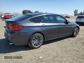 2014 BMW 5 Series GT 535i with VIN WBA5M2C55ED871907, listed as a Copart auction lot 73001564 with 90,576 mi miles and Salvage Title. Bid and sale history available at carsss.com. Image 3.