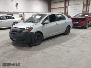 2008 Toyota Yaris with VIN JTDBT903781251568, listed as a IAAI auction lot 42090260 with 264,356 mi miles. Bid and sale history available at carsss.com. Image 2.