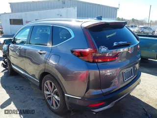 2021 Honda CR-V Touring with VIN 7FARW2H9XME012480, listed as a IAAI auction lot 41632487 with 59,684 mi miles. Bid and sale history available at carsss.com. Image 3.