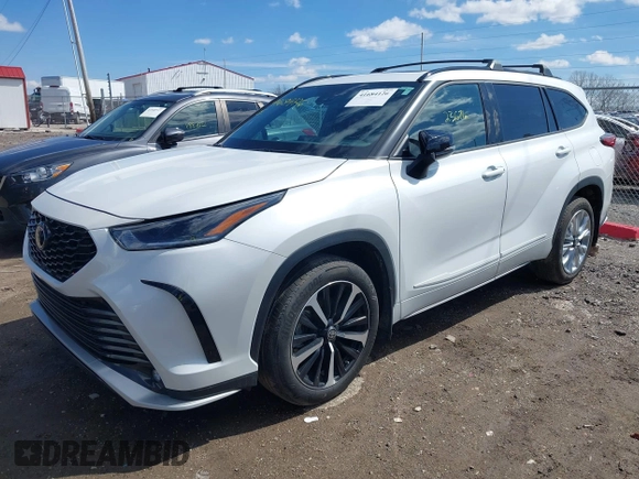2022 Toyota Highlander XSE with VIN 5TDLZRBH0NS235559, listed as a IAAI auction lot 41684126 with 23,671 mi miles and . Bid and sale history available at DreamBid. Image 2.