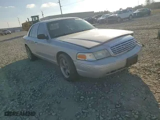 2004 Ford Crown Victoria LX with VIN 2FDFP74W74X150801, listed as a Copart auction lot 43869115 with 138,243 mi miles and Salvage Title. Bid and sale history available at carsss.com. Image 10.