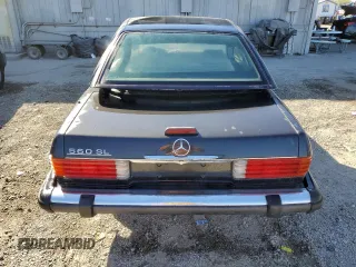 1987 Mercedes-Benz 560 SL with VIN WDBBA48D1HA072141, listed as a Copart auction lot 79715724 with 88,545 mi miles and Salvage Title. Bid and sale history available at DreamBid. Image 6.
