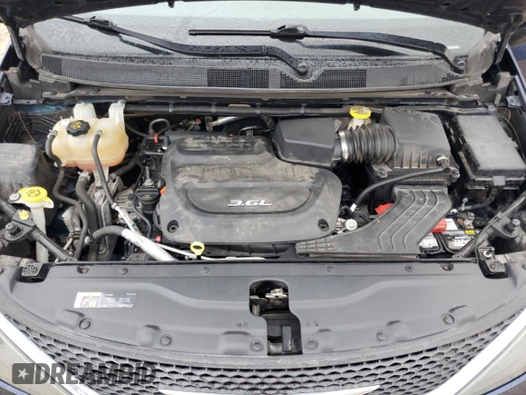 2018 Chrysler Pacifica Touring with VIN 2C4RC1DG4JR252255, listed as a Copart auction lot 51083805 with 119,563 mi miles and Clean title. Bid and sale history available at DreamBid. Image 12.