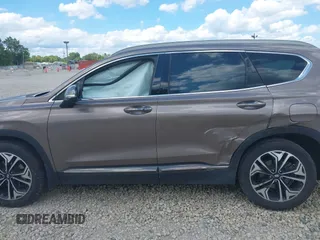 2020 Hyundai Santa Fe Limited with VIN 5NMS53AA5LH191809, listed as a IAAI auction lot 39804008 with 115,775 mi miles and . Bid and sale history available at DreamBid. Image 14.
