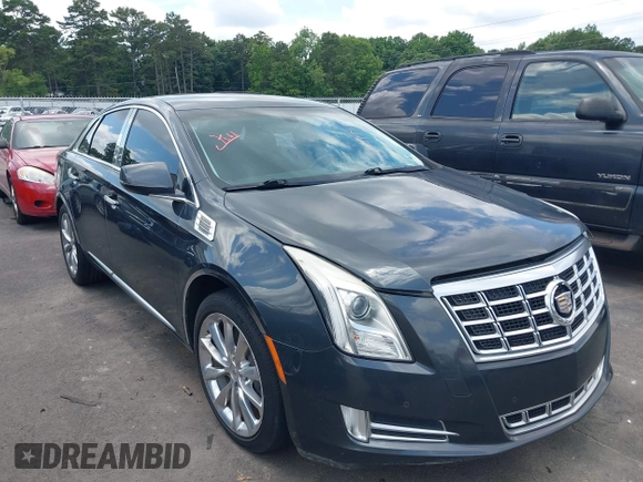 2013 Cadillac XTS Luxury с VIN 2G61P5S34D9183910, выставлен на аукционе IAAI как лот 42479531 с пробегом 160 798 миль миль и . История ставок и продаж доступна на DreamBid. Изображение 1.